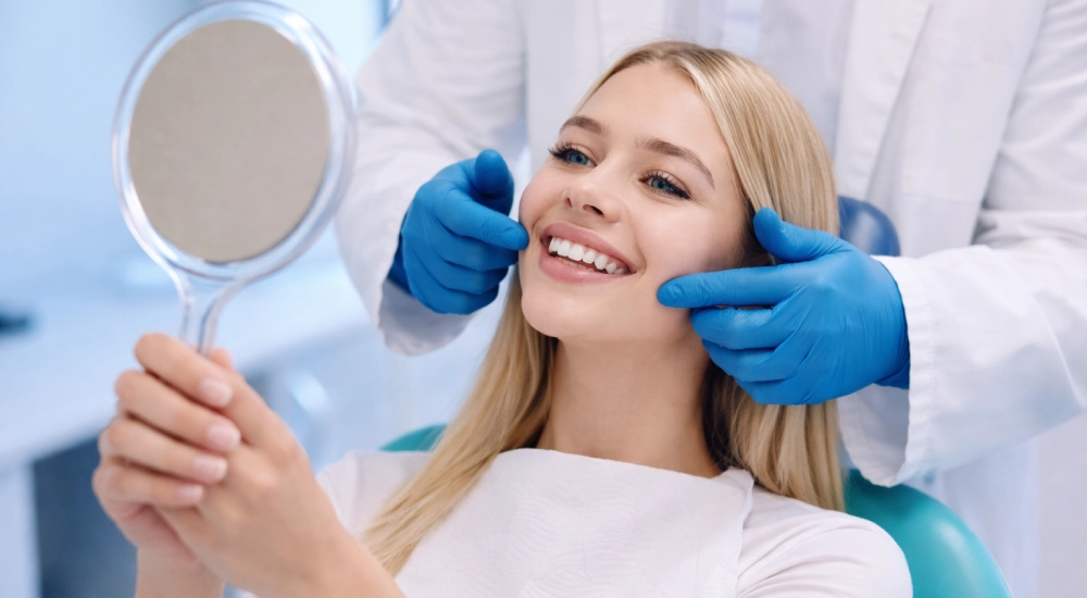 Female patient after cosmetic dental treatment